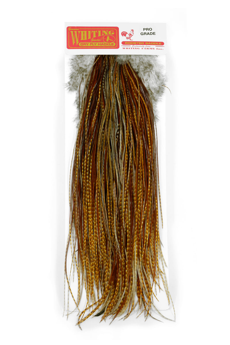 Whiting Pro Grade Midge Saddle in Barred Dark Ginger, front view with Pro Grade Rooster Saddle label