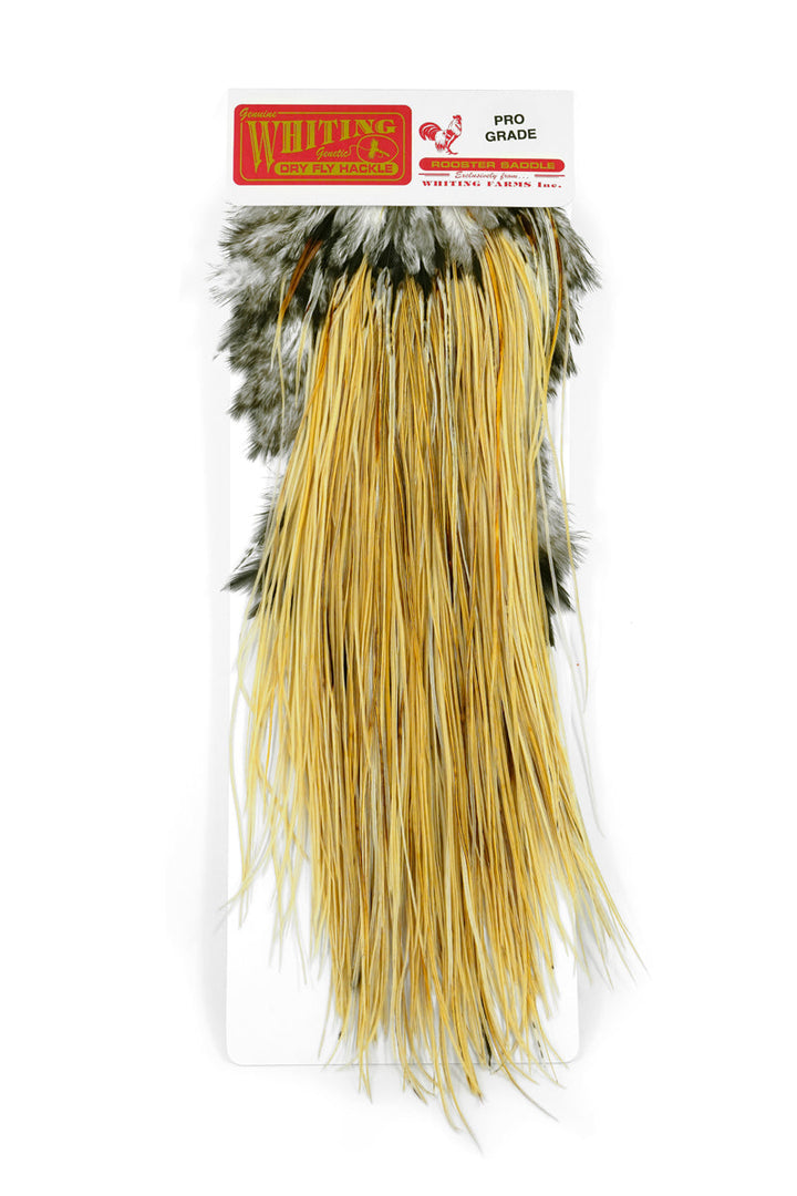 Whiting Pro Grade Midge Saddle in Light Ginger, front view with Pro Grade Rooster Saddle label